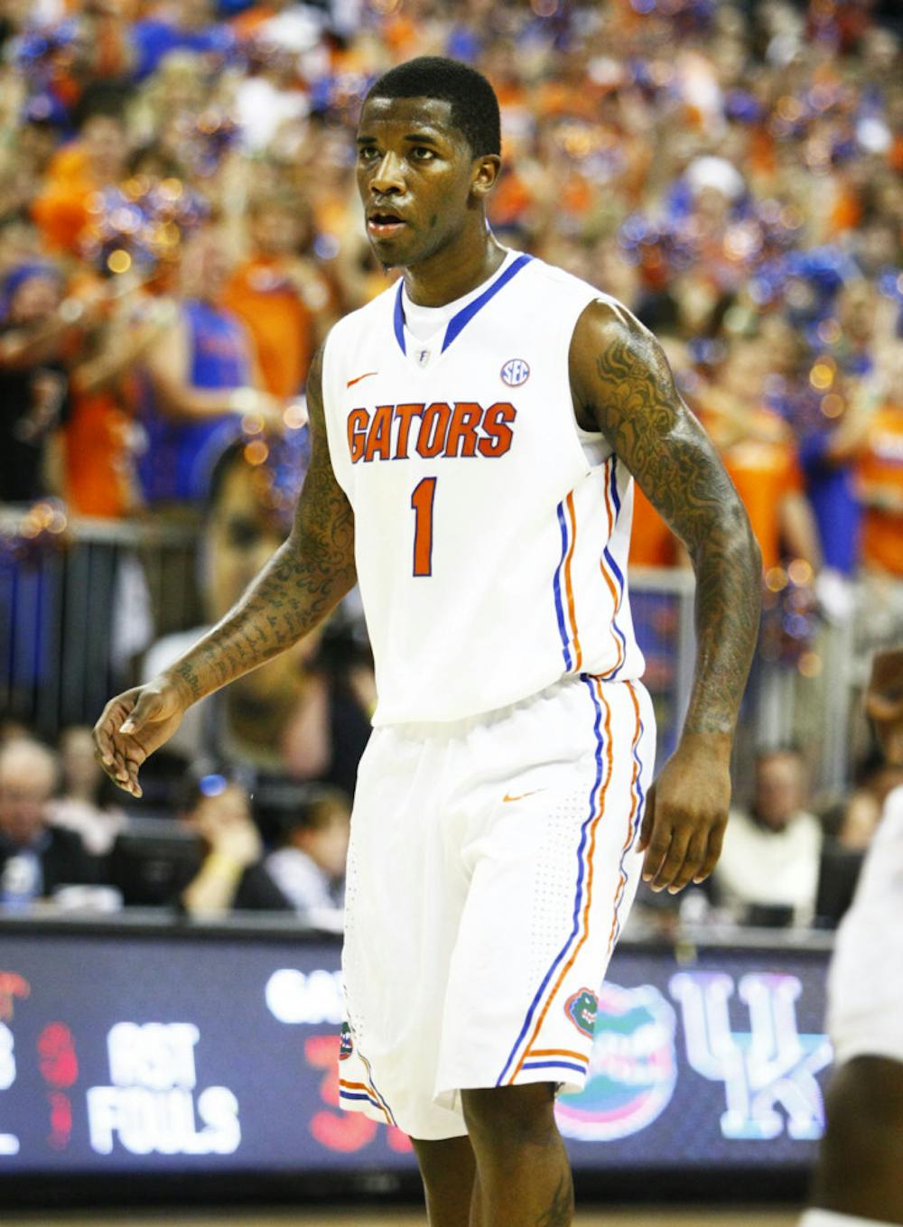 <p>Senior guard Kenny Boynton walks back to play defense after scoring during Florida’s 69-52 victory against Kentucky on Feb. 12 in the O’Connell Center. </p>