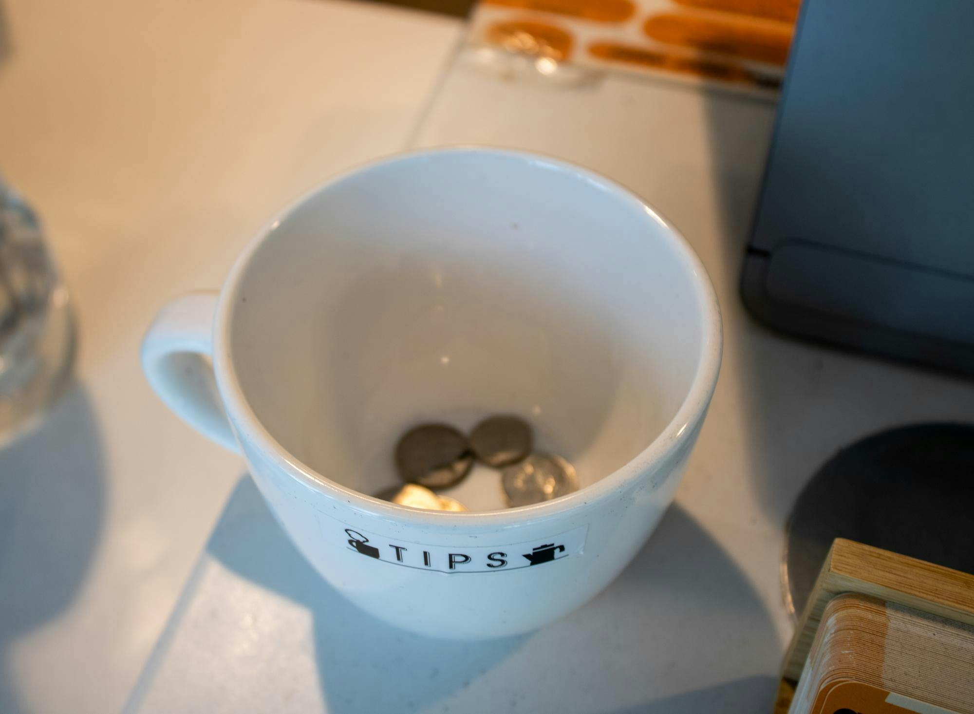 A tip jar at Opus Coffee, Friday, Sept. 4, 2026, in Gainesville, Fla.