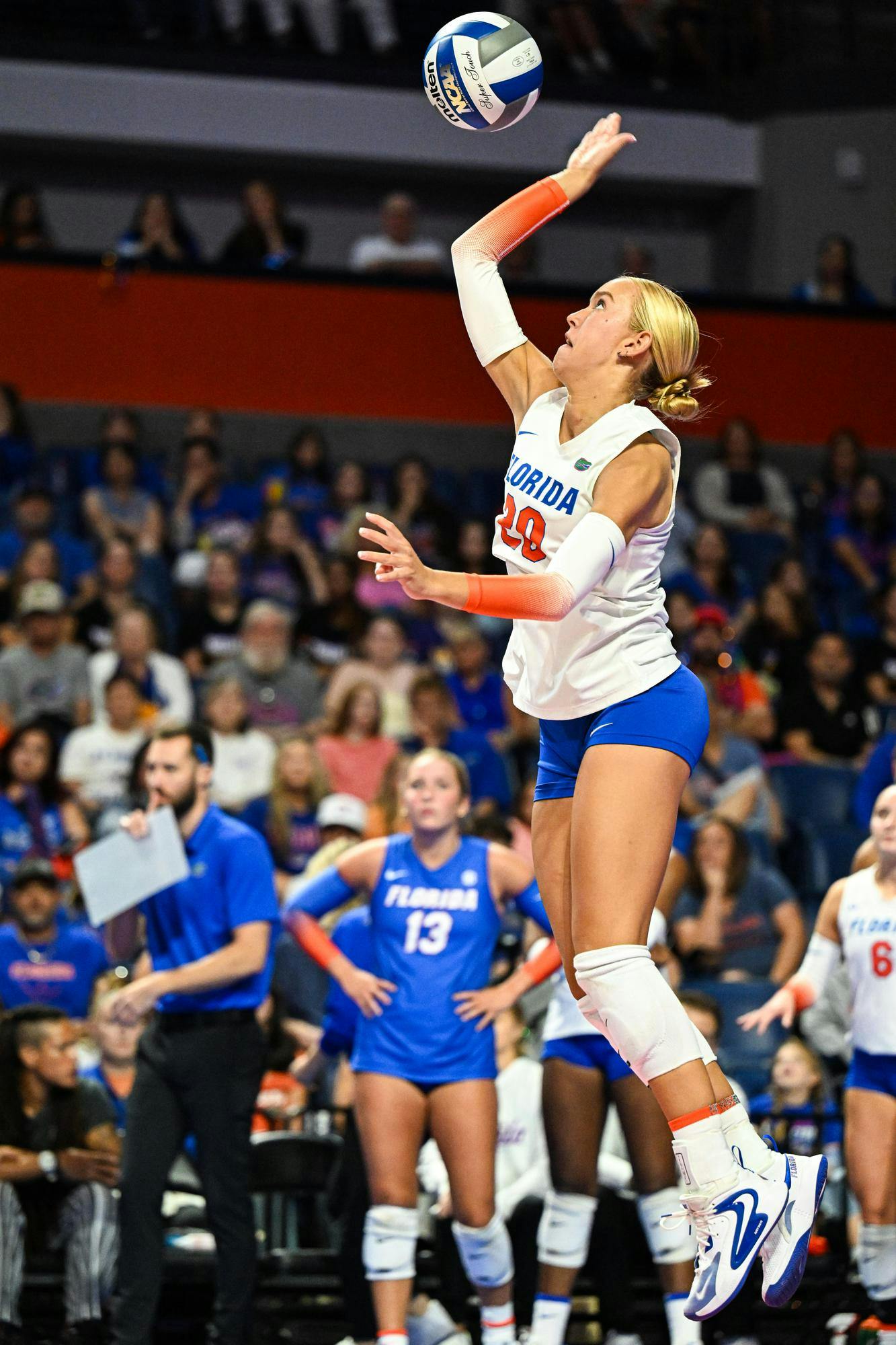 Florida Gators setter Taylor Parks (20) serves the ball in a volleyball match against the Norfolk State Spartans on Sunday, Aug. 31, 2025, at the O'Connell Center in Gainesville, Fla.