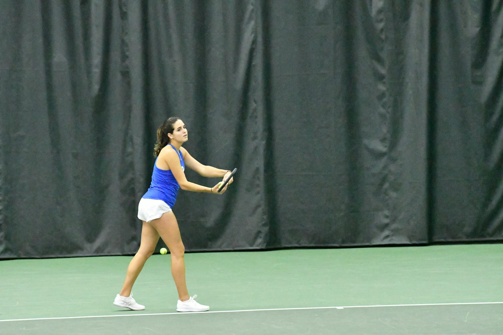 Florida sophomore Emily De Oliveira serves the ball in the Gators' 6-1 victory against the Baylor Bears Sunday, Feb. 5, 2023. Photo by Shelby Hild.