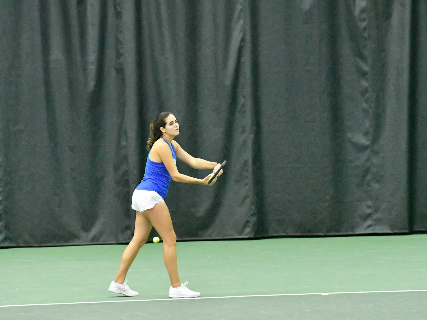 Florida sophomore Emily De Oliveira serves the ball in the Gators' 6-1 victory against the Baylor Bears Sunday, Feb. 5, 2023. Photo by Shelby Hild.