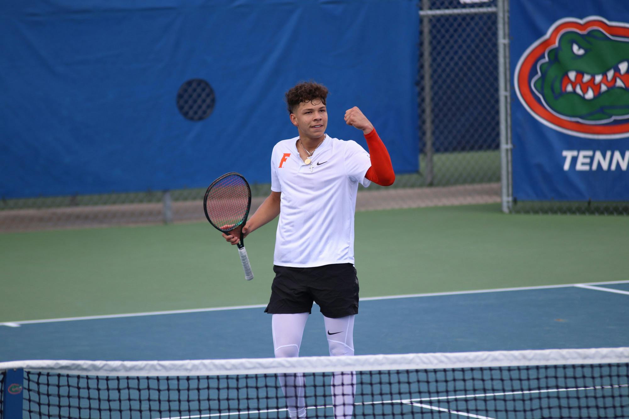 Ben Shelton celebrates on Feb. 21 against Auburn. Shelton clinched the championship point for the Gators Saturday.