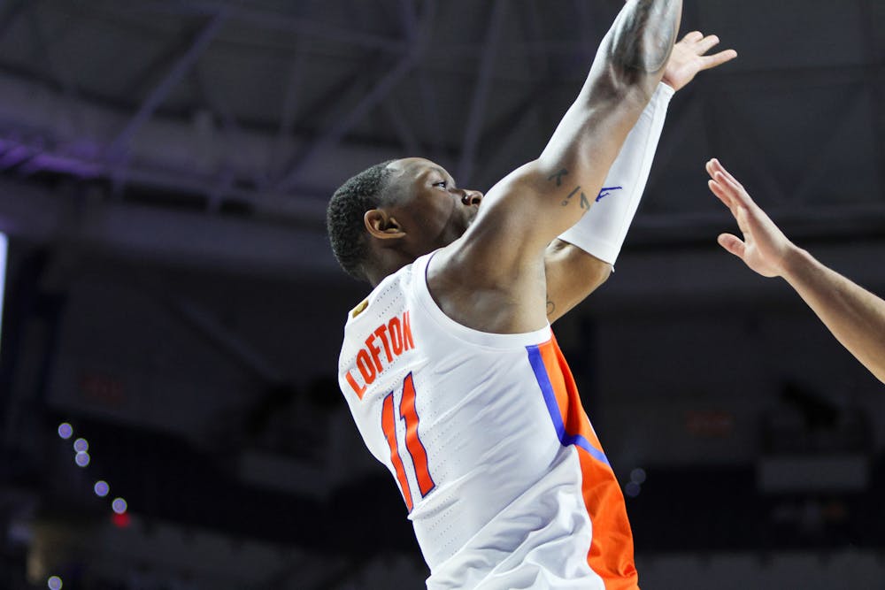 Guard Kyle Lofton rises up for a shot against the Florida Atlantic Owls Monday, Nov. 14, 2022. Lofton lead the Gators in scoring against West Virginia Sunday night with 17 points. 