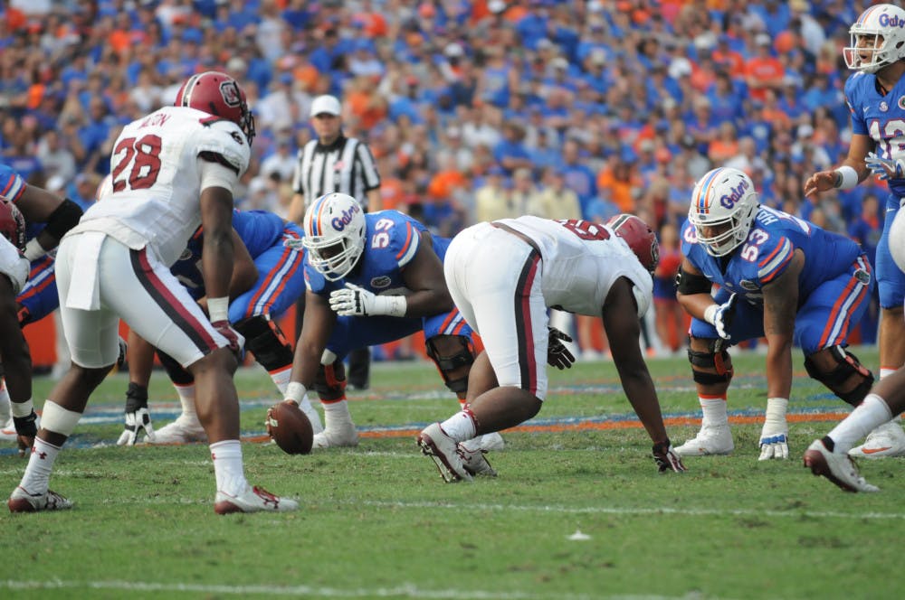 T.J. McCoy (59) prepares to snap the ball during Florida's win against South Carolina on Nov. 12, 2016, at Ben Hill Griffin Stadium.