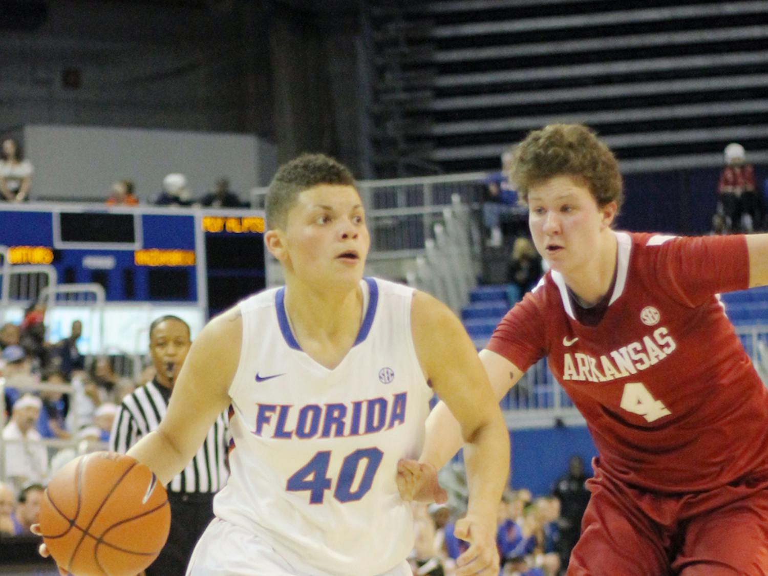 Freshman guard Sydney Moss (40) drives to the basket during Florida 69-58 win against Arkansas on Feb. 28 in the O’Connell Center.