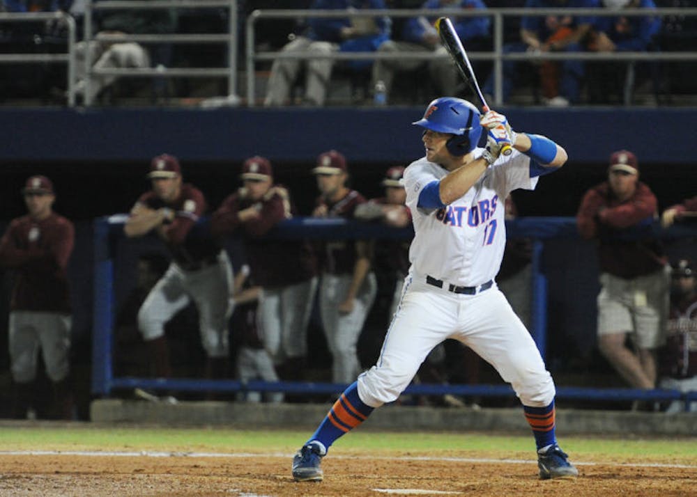 <p>Taylor Gushue bats during Florida’s 3-1 win against Florida State on March 18 at McKethan Stadium. Gushue hit a single to start a four-run rally in the eighth inning of UF’s 6-5 win against USC on Sunday.</p>