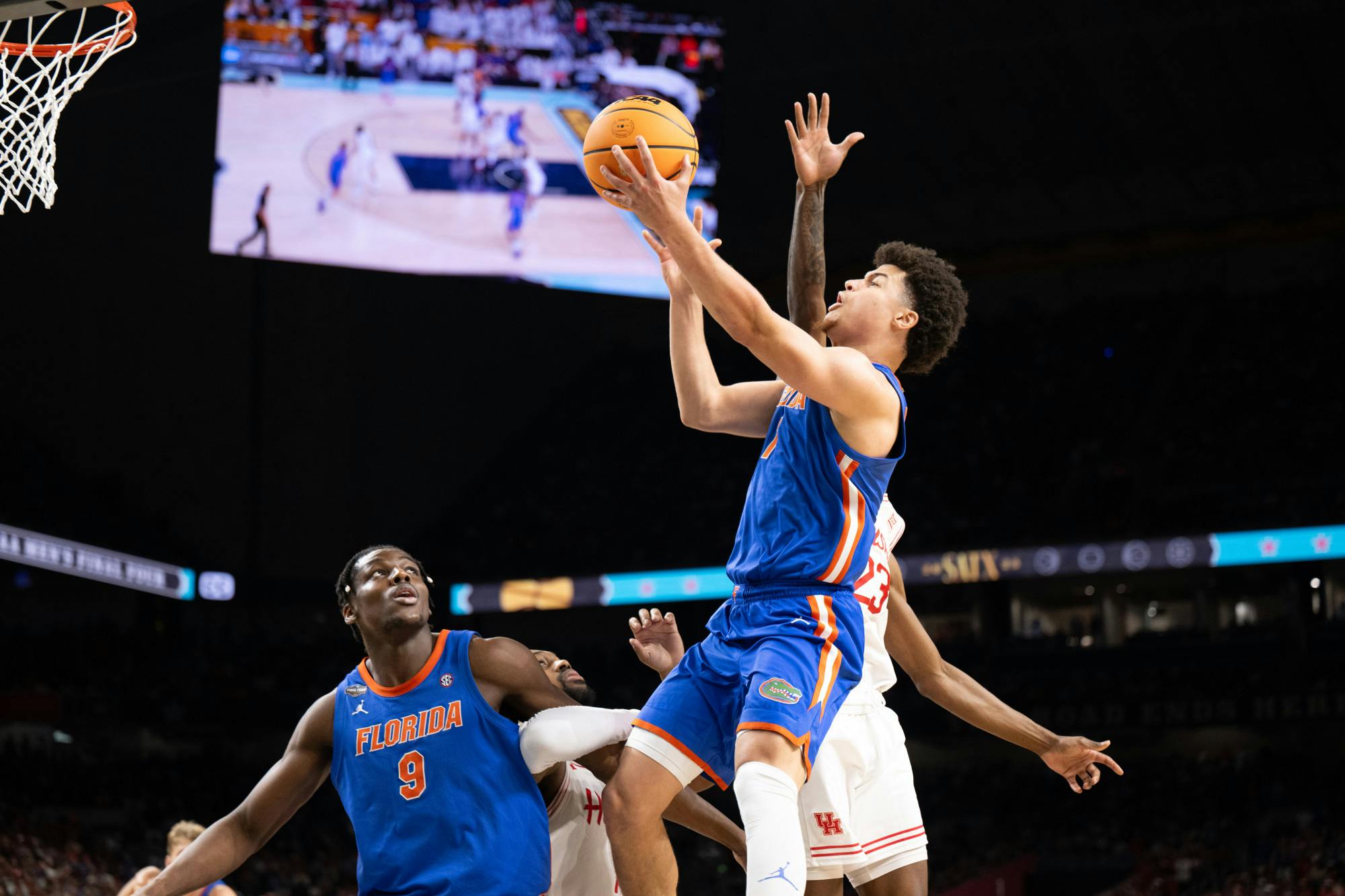 Florida Gators guard Walter Clayton Jr. (1) shoots a layup during a basketball game against the Houston Cougars in the National Championship round of the NCAA Tournament on Monday, April 7, 2025, in San Antonio, Texas.
