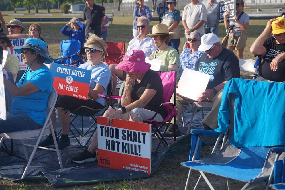 <p>Protestors gather outside the Florida State Prison before an execution, Tuesday, April 21, 2026, in Raiford, Fla.</p>