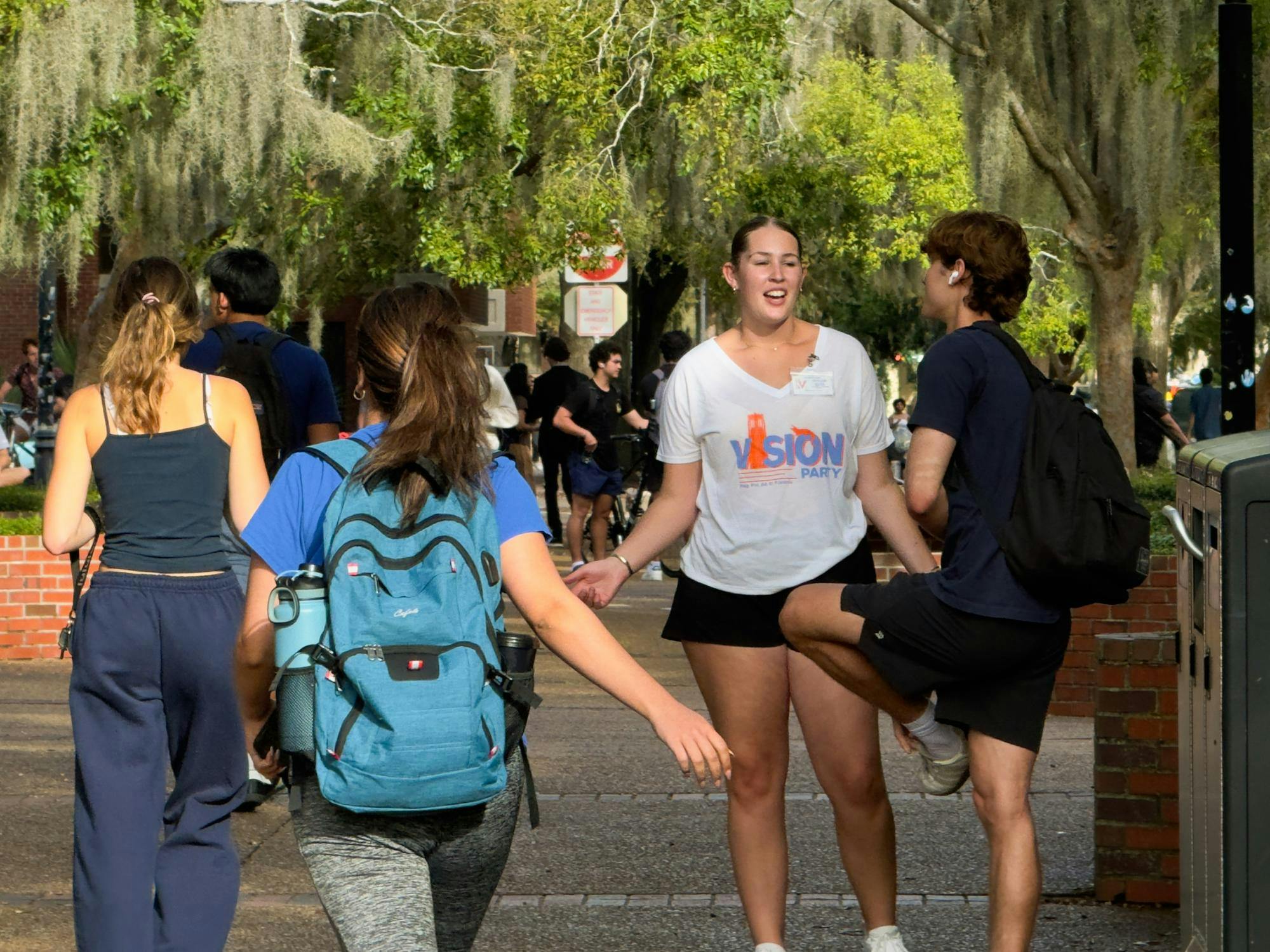 A Vision Party member campaigning outside of Turlington Plaza during the University of Florida falll student government election on September 29, 2025.