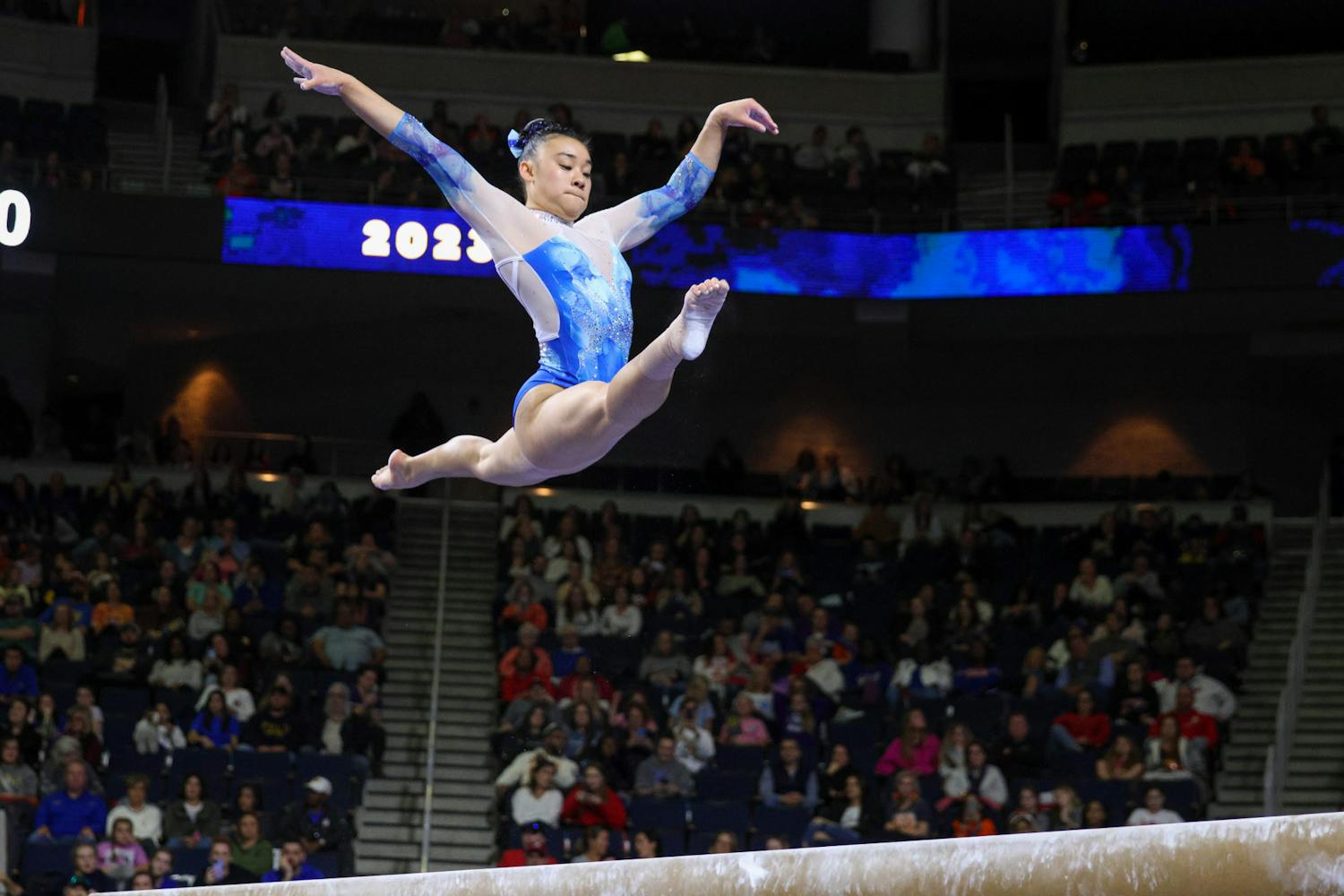 Florida sophomore Leanne Wong jumps in the air during her balance beam routine in the Southeastern Conference Championship Saturday, March 18, 2023.