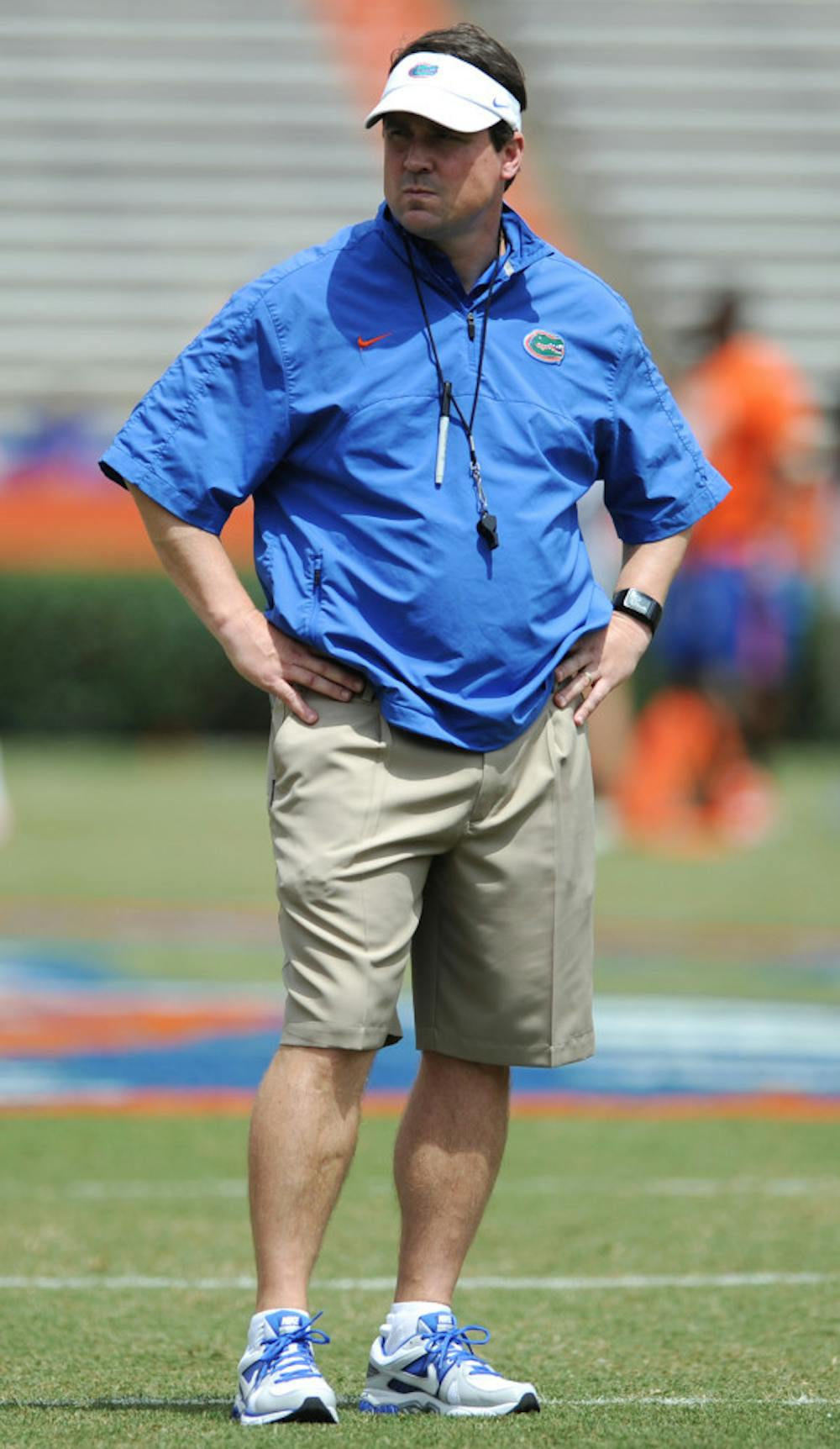 <p>Will Muschamp looks on during the Orange &amp; Blue Debut on April 12 in Ben Hill Griffin Stadium.</p>