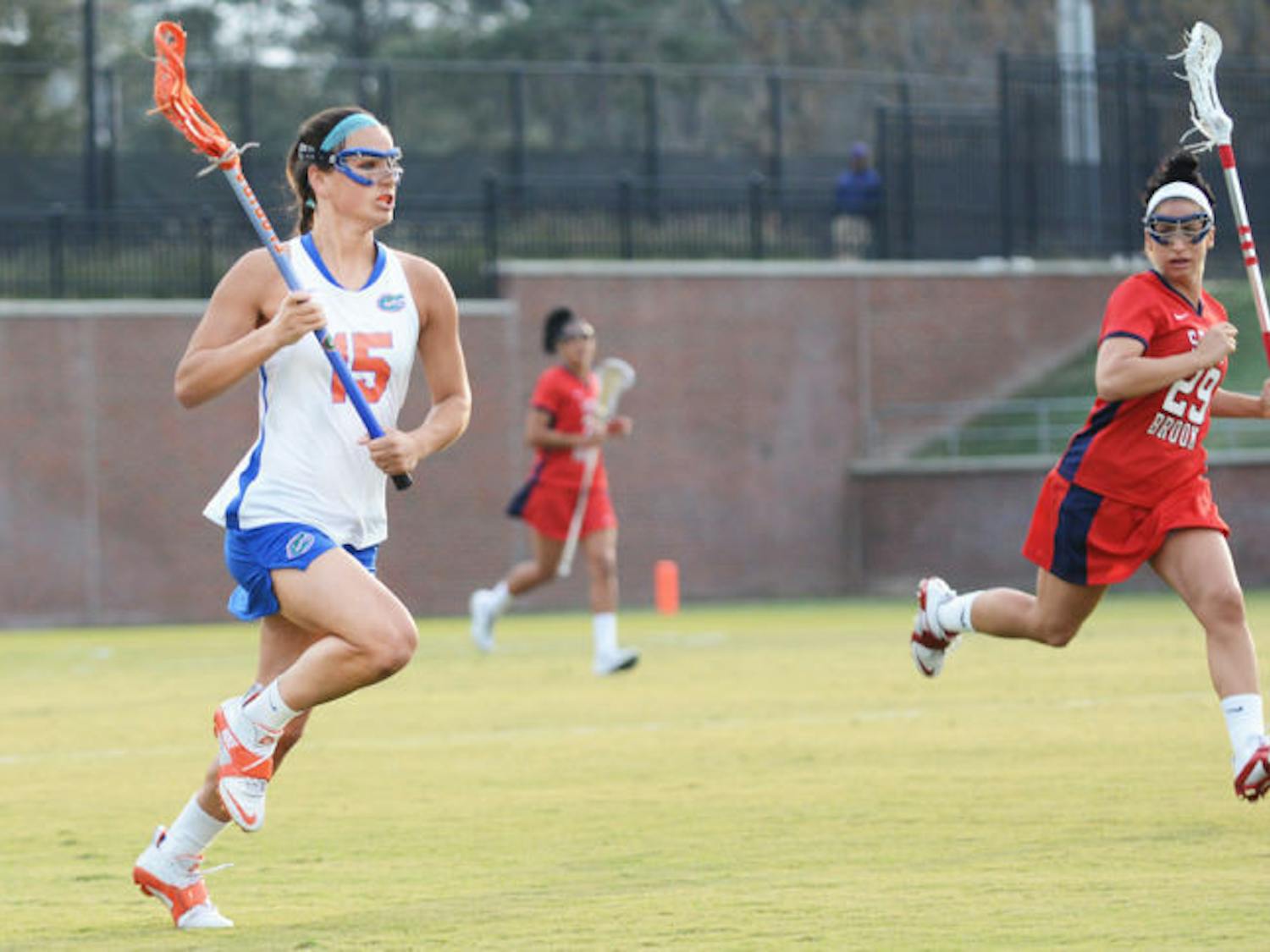 Senior Sam Farrell runs down the field during Florida’s 16-9 win against Stony Brook on Feb. 20 at Dizney Stadium. UF will clinch the American Lacrosse Conference championship outright win a win against Northwestern on Saturday and a Penn State loss.