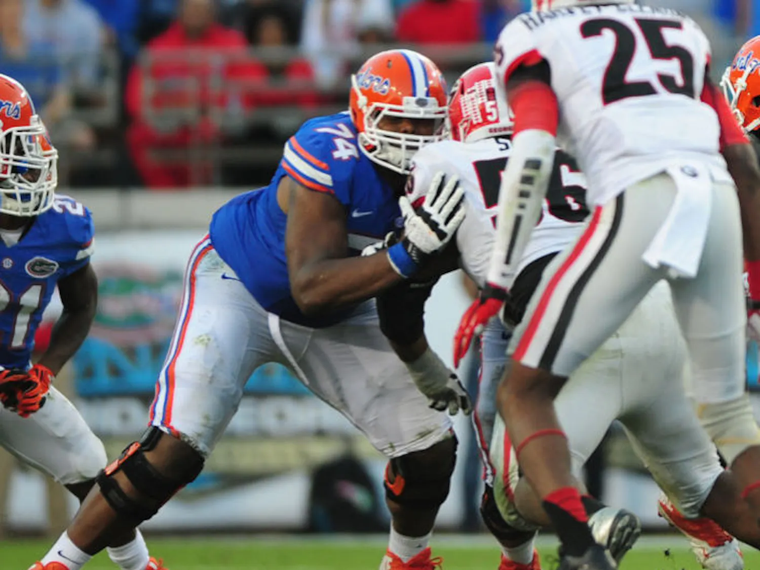 Florida right tackle Trenton Brown (74) blocks Georgia defensive lineman Garrison Smith (56) during the Gators’ 23-20 loss to the Bulldogs on Saturday at EverBank Field in Jacksonville.