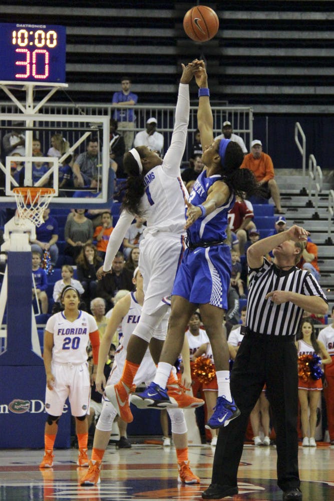 Ronni Williams jumps during the tipoff of Florida's 85-79 win over Kentucky on Jan. 31, 2016, in the O'Connell Center.