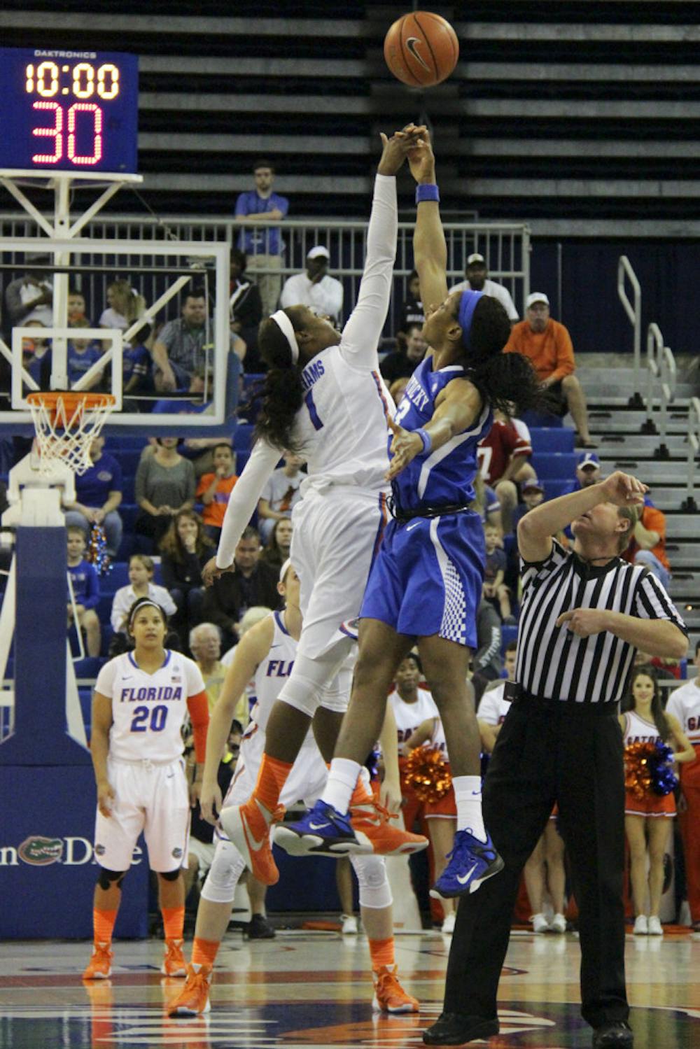 <p>Ronni Williams jumps during the tipoff of Florida's 85-79 win over Kentucky on Jan. 31, 2016, in the O'Connell Center.</p>