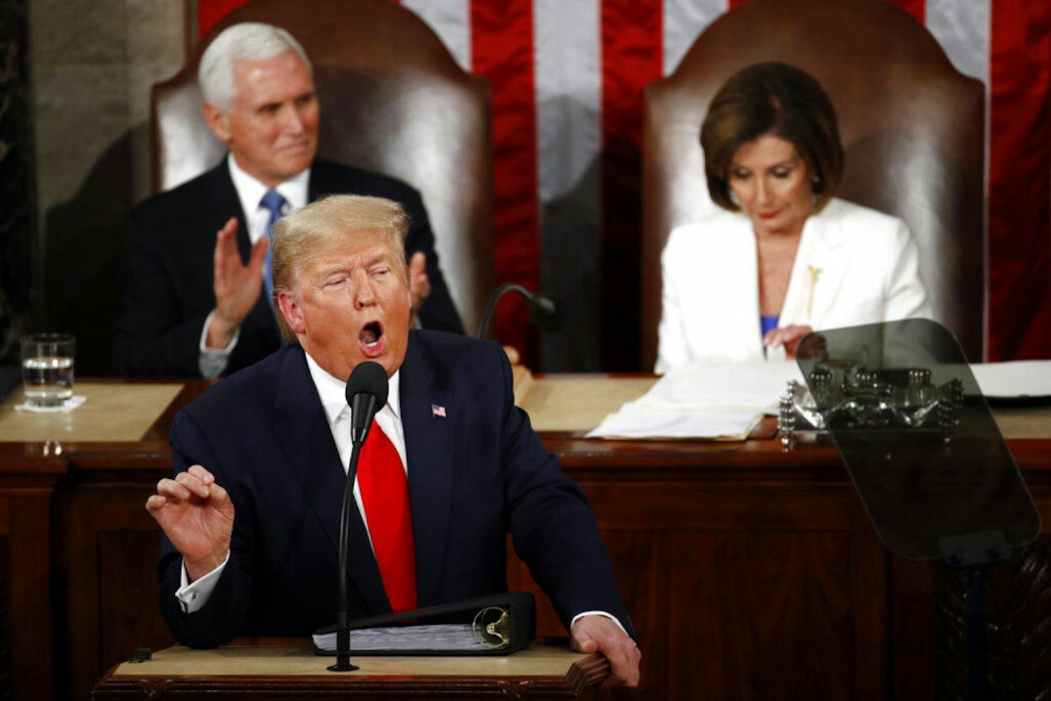 President Donald Trump delivers his State of the Union address to a joint session of Congress on Capitol Hill in Washington, Tuesday, Feb. 4, 2020, as Vice President Mike Pence ad House Speaker Nancy Pelosi of Calif., listen. (AP Photo/Patrick Semansky)