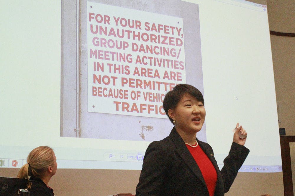 <p>Jessie Wang, a 20-year-old UF psychology junior, speaks at a Student Senate meeting on Oct. 27, 2015, about the University Athletic Association banning students from dancing or meeting outside Ben Hill Griffin Stadium. She asked senators to support the Asian American Student Union for its right to practice at the stadium.</p>