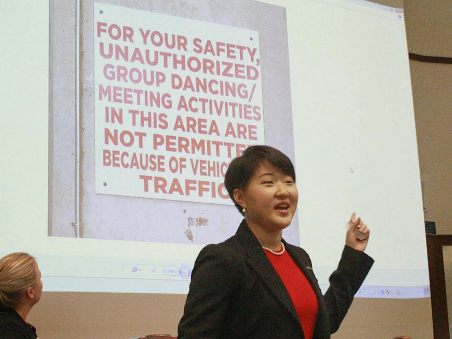 Jessie Wang, a 20-year-old UF psychology junior, speaks at a Student Senate meeting on Oct. 27, 2015, about the University Athletic Association banning students from dancing or meeting outside Ben Hill Griffin Stadium. She asked senators to support the Asian American Student Union for its right to practice at the stadium.