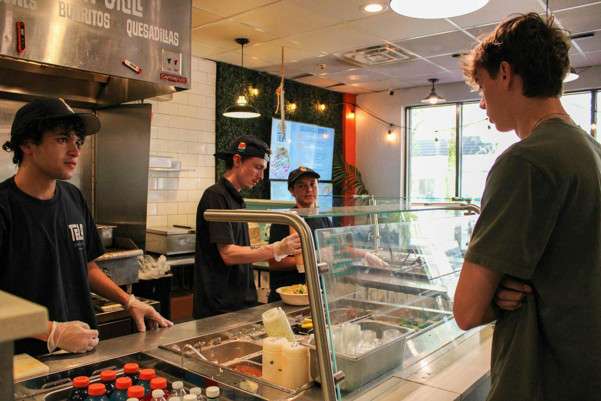 Workers at Tela’s current Midtown location, Sunday, Oct. 4, 2026, in Gainesville, Fla.