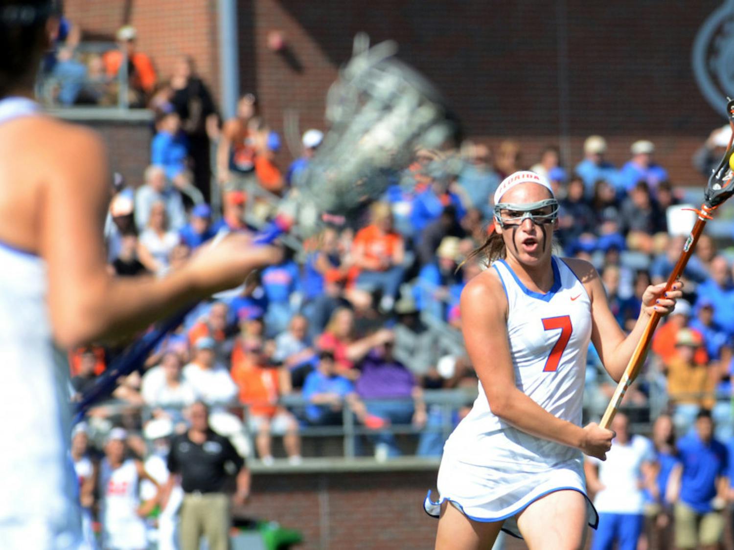 Freshman attacker Shayna Pirreca (7) looks to pass the ball during Florida's 17-11 loss to North Carolina on Feb. 7 at Donald R. Dizney Stadium.