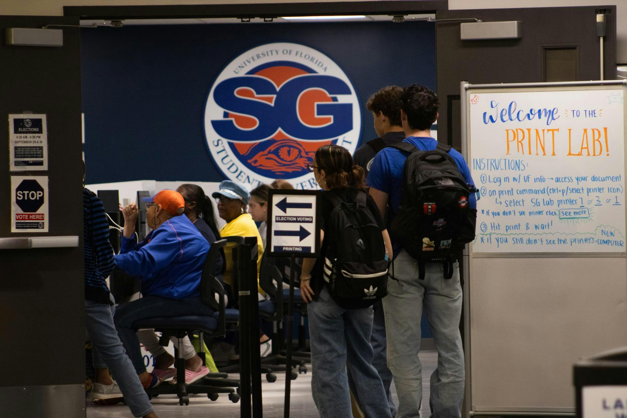 Students wait to enter the polling room at Reitz Union Print Lab, Tuesday, Sept. 29, 2026, in Gainesville, Fla.
