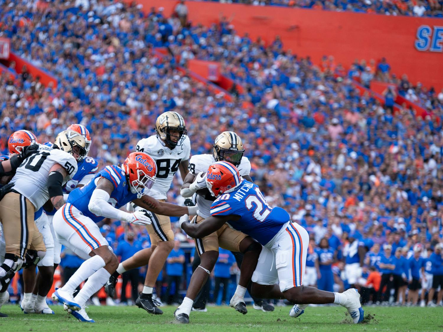 Redshirt senior linebacker Teradja Mitchell makes a tackle in the Gators’ 38-14 win against the Vanderbilt Commodores on Saturday, Oct. 7, 2023.