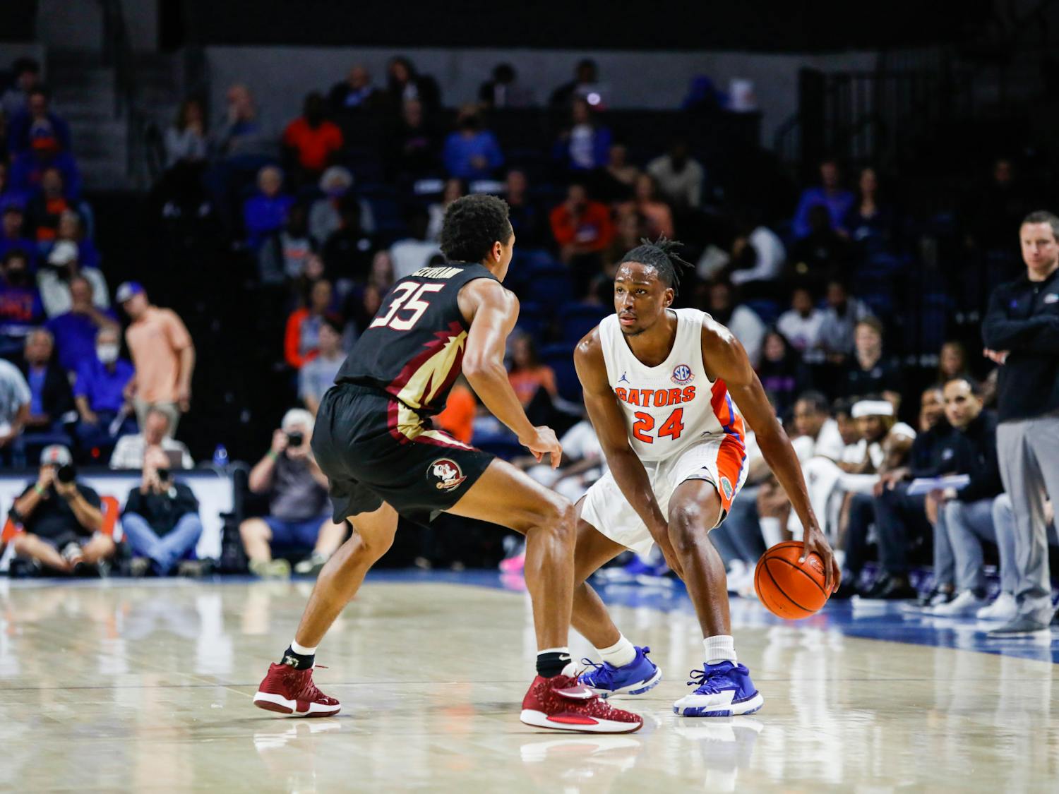 Florida&#x27;s Phlandrous Fleming matches up against Florida State&#x27;s Matthew Cleveland during a Nov. 14 game. Fleming scored a team-high 14 points against South Carolina Sunday.