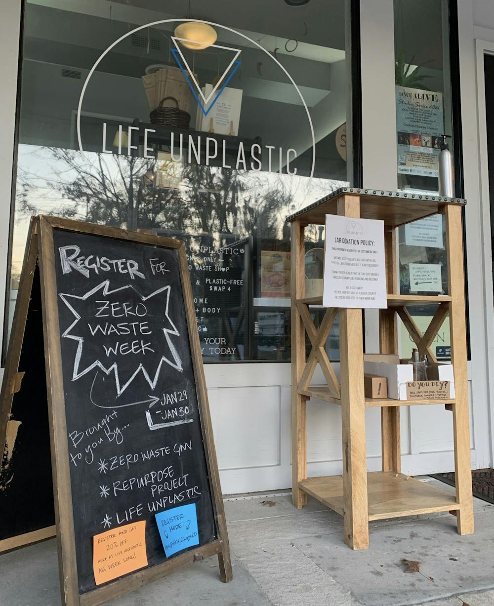 The storefront of Life Unplastic offers information about the second annual Zero Waste Week.