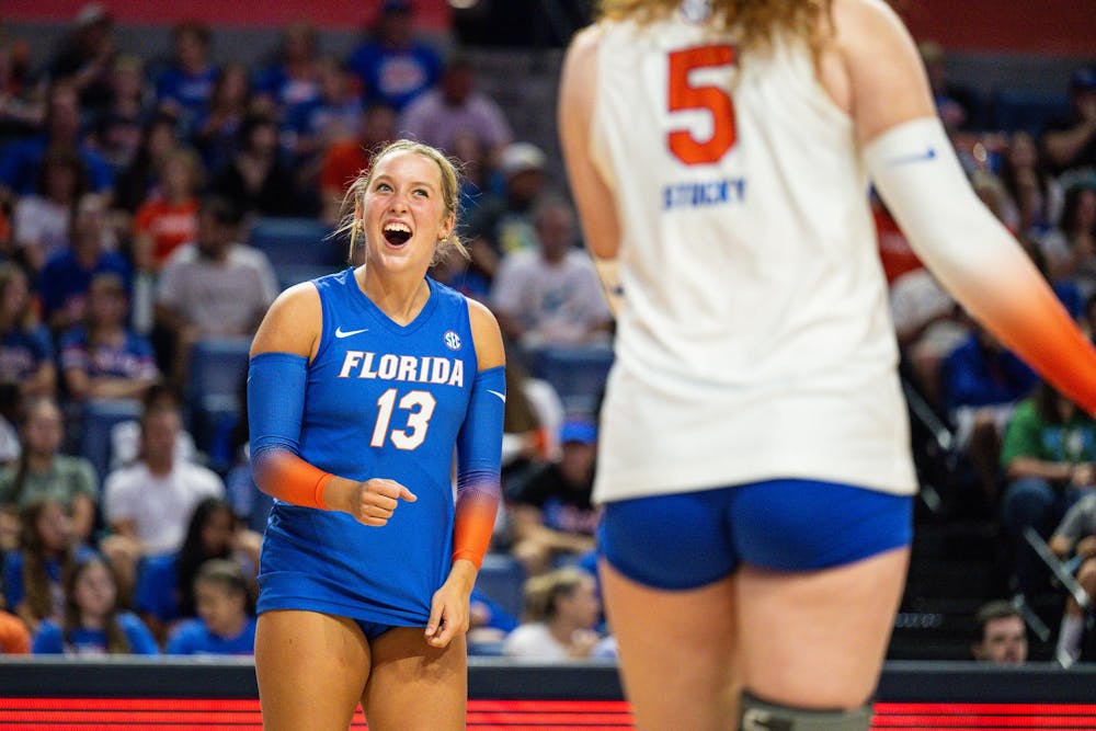Florida Gators libero/defensive specialist Lily Hayes (13) exclaims during a volleyball match against the Norfolk State Spartans on Sunday, Aug. 31, 2025, at the O'Connell Center in Gainesville, Fla.
