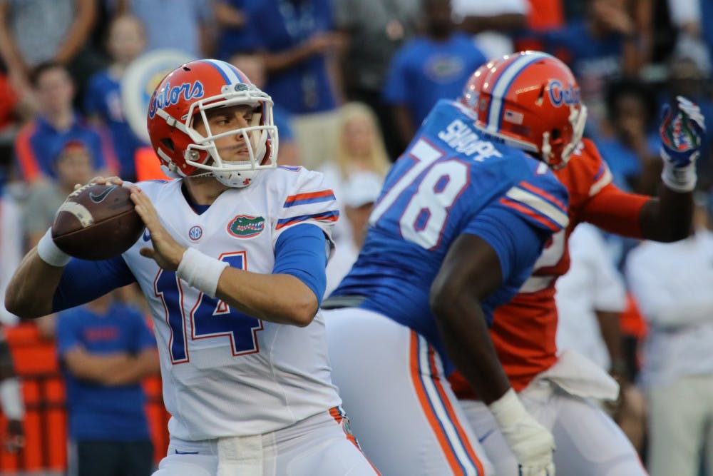 Quarterback Luke Del Rio (14) drops back to pass during Florida's Orange &amp; Blue Debut on April 8, 2016, at Ben Hill Griffin Stadium.