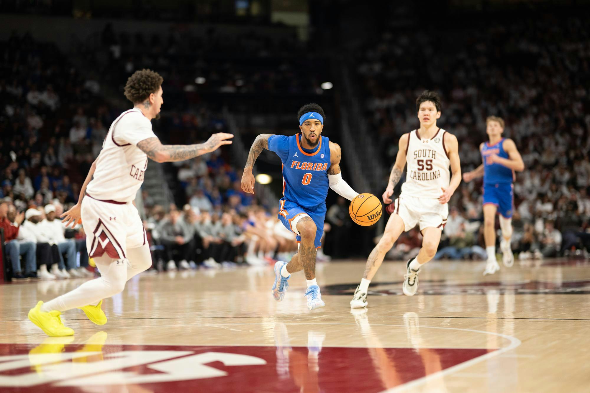 Florida guard Boogie Fland (0) drives during the first half of an NCAA college basketball game against South Carolina, Wednesday, Jan. 28, 2026, in Columbia, S.C.