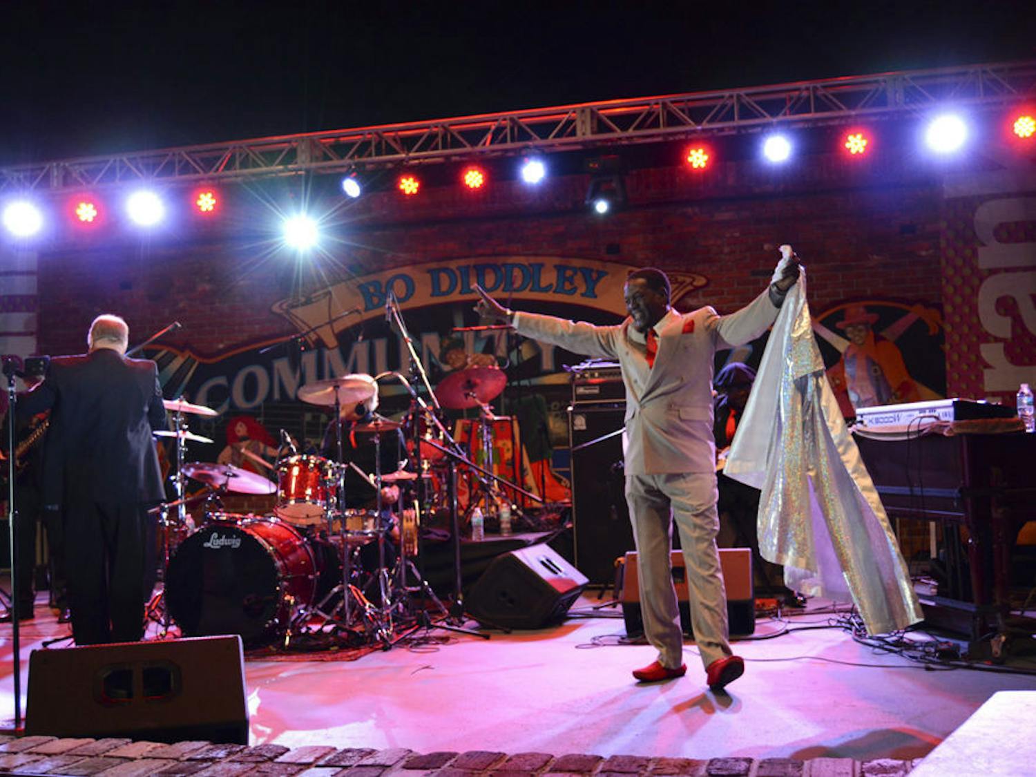 A crowd gathered to watch a variety of musical performances at Bo Diddley Community Plaza’s grand reopening event, featuring The Savants of Soul and Little Jake & the Soul Searchers and headlined by Charles Bradley.