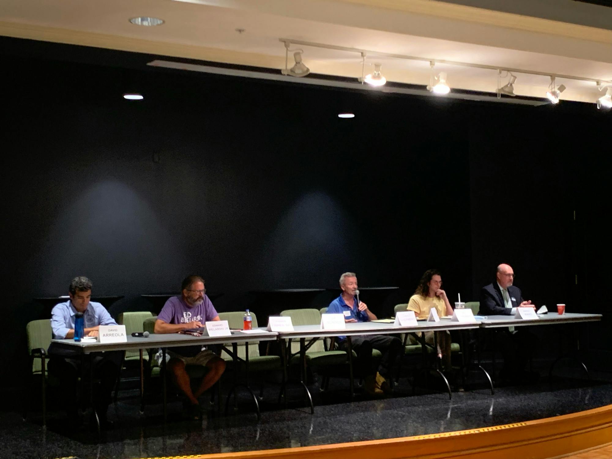 Gainesville's mayoral candidates speak to about 80 Oak Hammock residents Tuesday, July 12, 2022. 