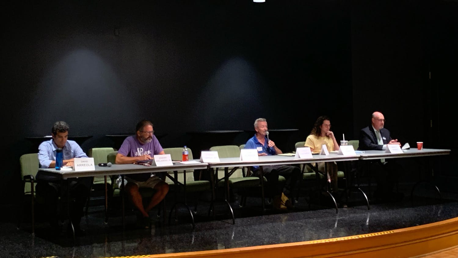 Gainesville's mayoral candidates speak to about 80 Oak Hammock residents Tuesday, July 12, 2022. 