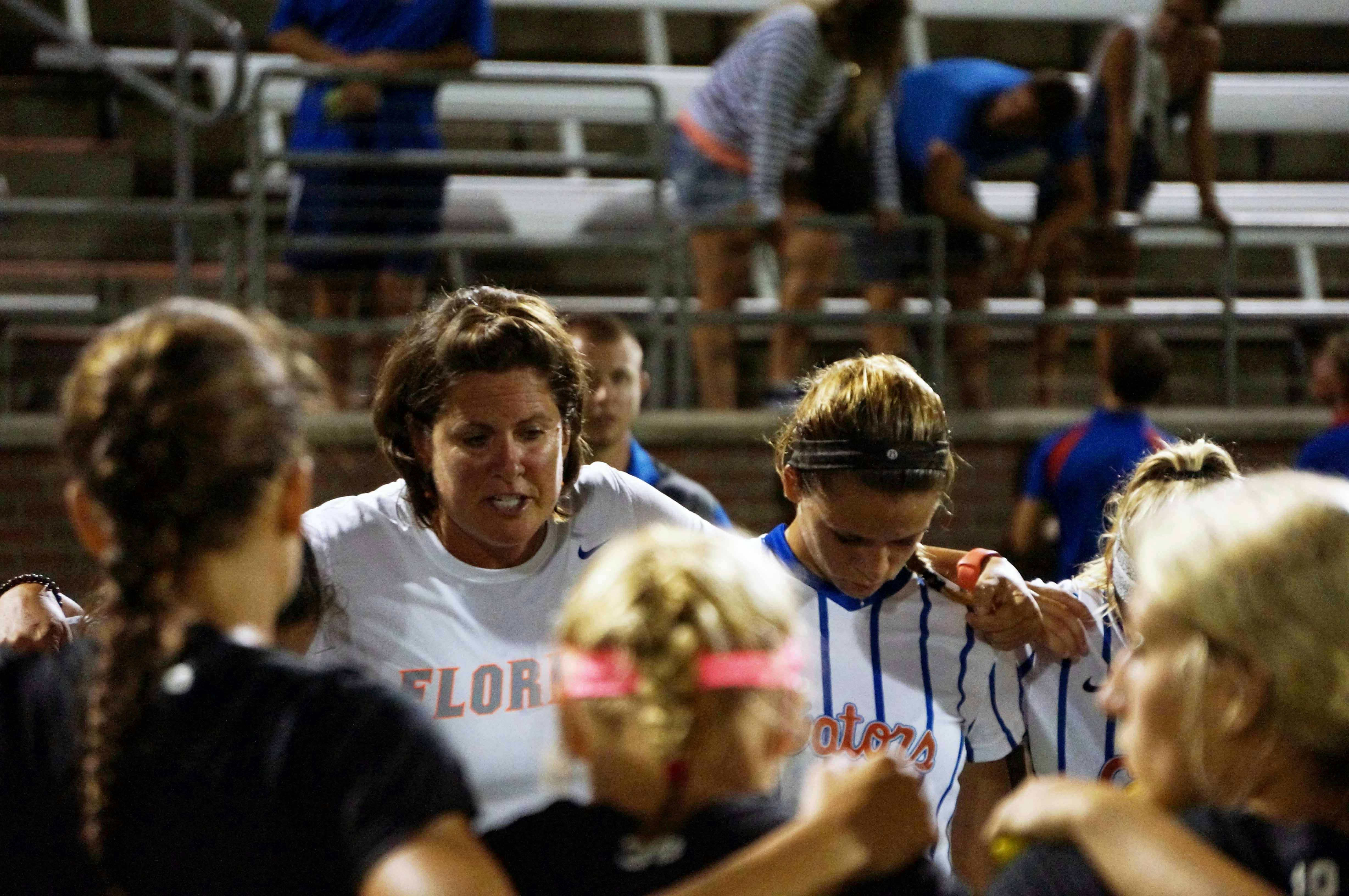 UF soccer coach Becky Burleigh talks with her team following Florida's 2-1 loss to Texas A&amp;M on Sept. 10, 2015, at Donald R. Dizney Stadium.