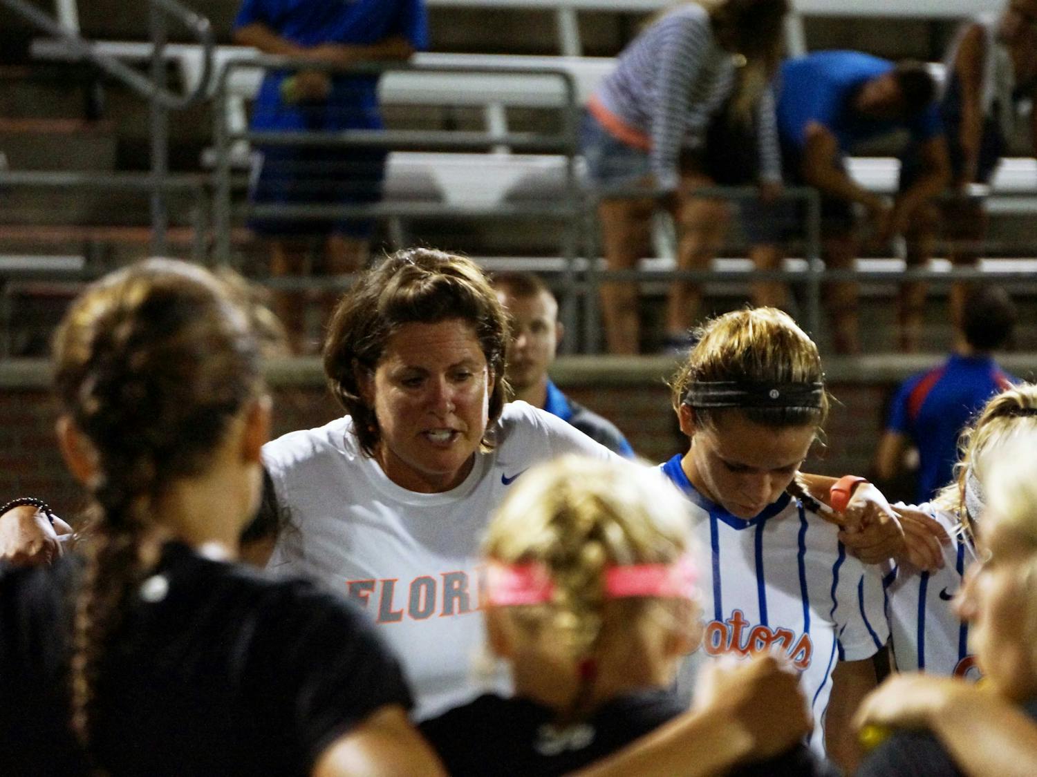 UF soccer coach Becky Burleigh talks with her team following Florida's 2-1 loss to Texas A&amp;M on Sept. 10, 2015, at Donald R. Dizney Stadium.