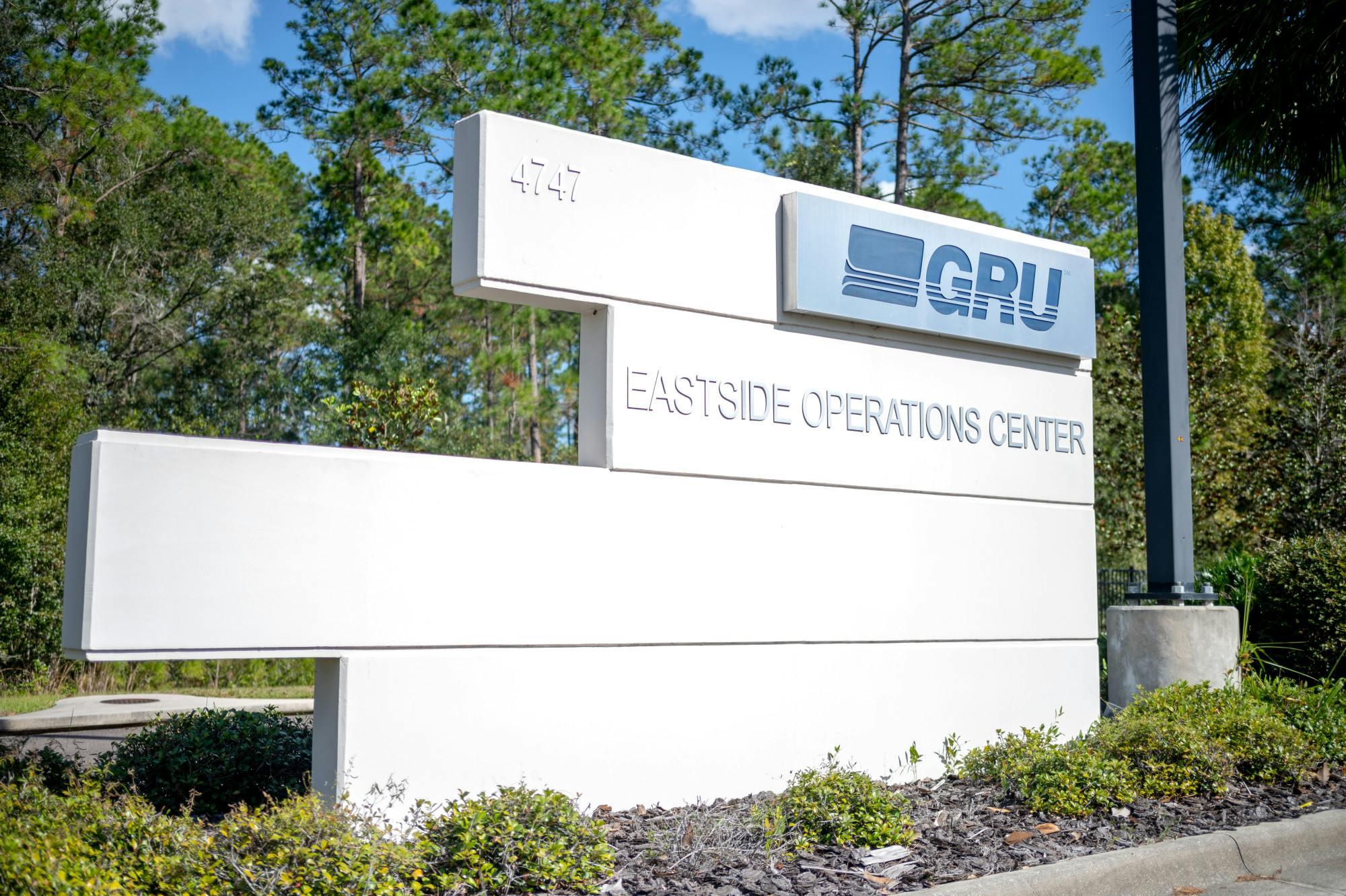The company sign for GRU stands outside its secured government complex in North Gainesville, on Sunday, Nov. 17, 2024.