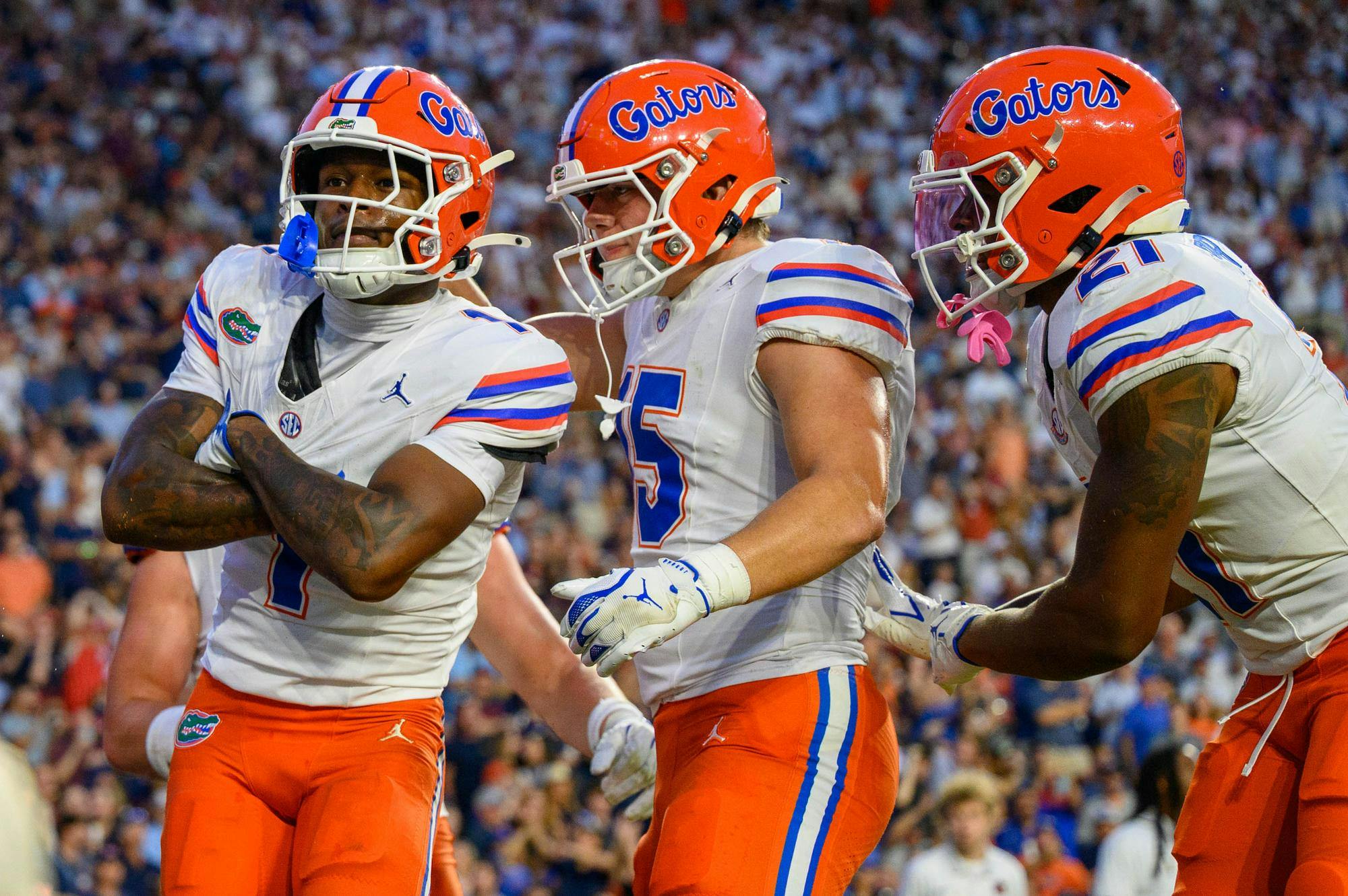 Florida wide receiver Vernell Brown III (1) celebrates with tight end Luke Harping (15) and running back Evan Pryor (21) during the first half of an NCAA college football game against Auburn, Saturday, Sept. 19, 2026, in Auburn, Ala.