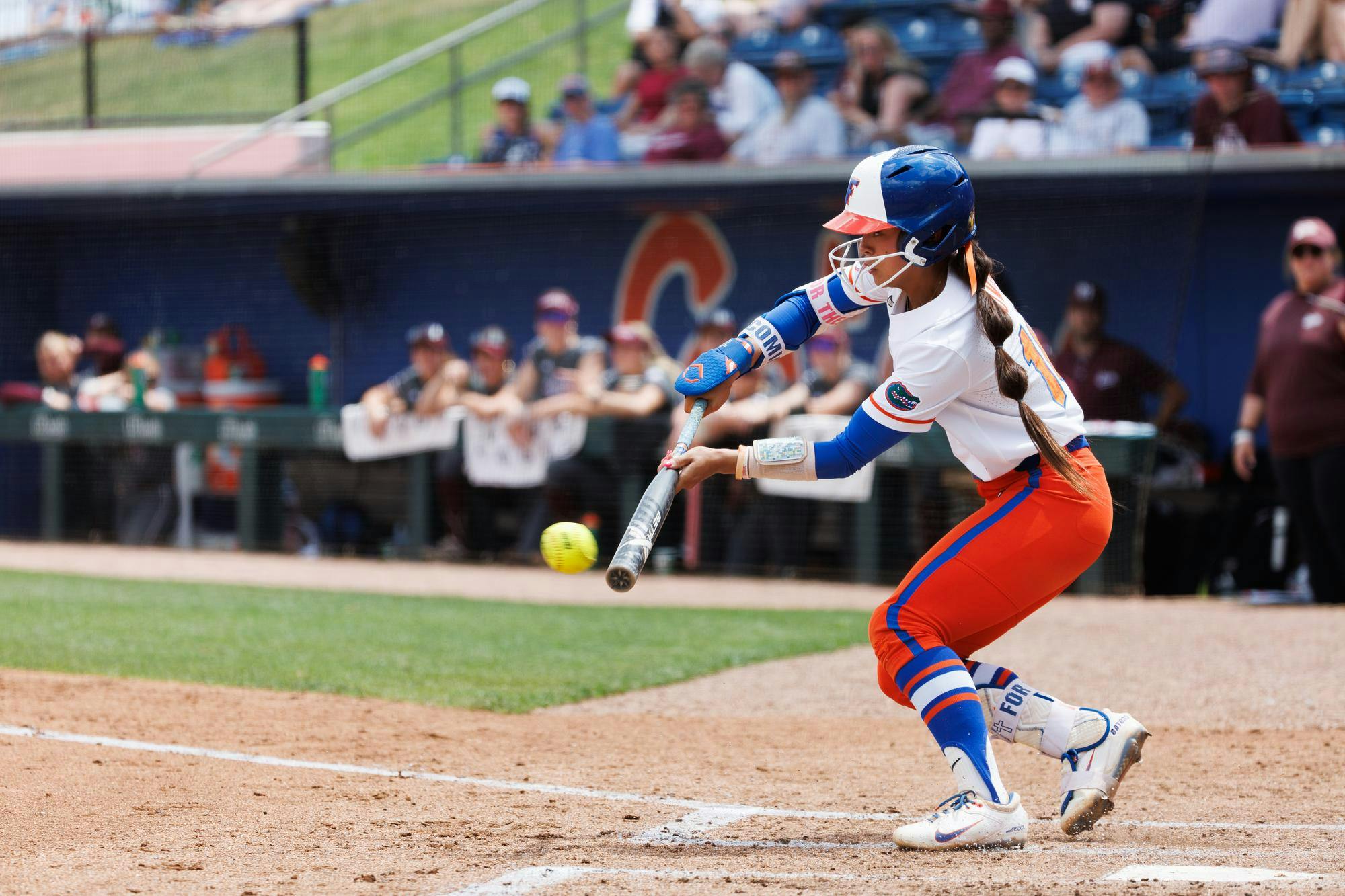 Florida Gators infielder Gabi Comia bunts during an NCAA softball game against Mississippi State, Sunday, April 5, 2026, in Gainesville, Fla.