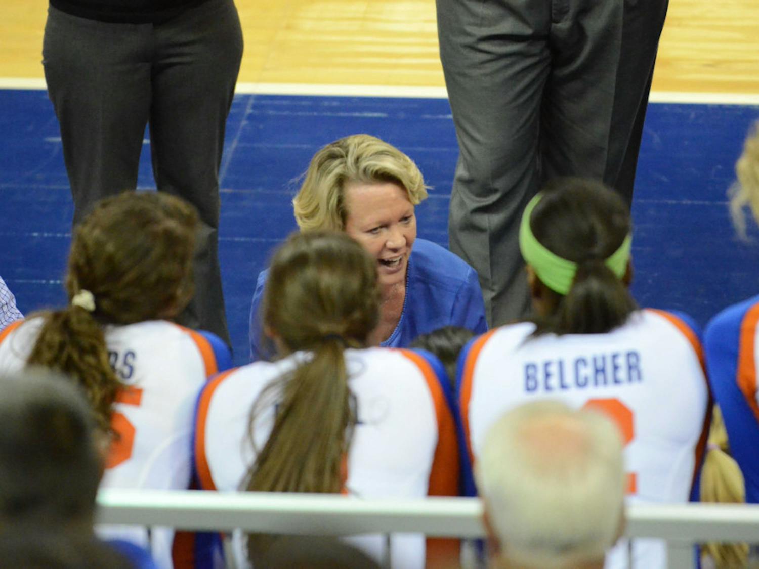 UF coach Mary Wise talks to her team during a timeout in Florida's 3-0 win against Auburn.