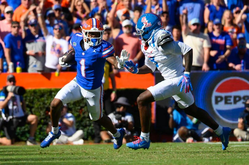 Florida wide receiver Vernell Brown III (1) escapes a defender during the first half of an NCAA college football game against Ole Miss, Saturday, Sept. 26, 2026, in Gainesville, Fla.