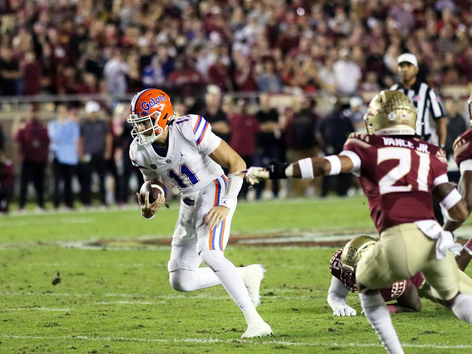 Florida quarterback Jalen Kitna runs the ball against the Florida State Seminoles Friday, Nov. 25, 2022. ﻿Kitna is indefinitely suspended from the Gators football team after being arrested on child pornography charges.