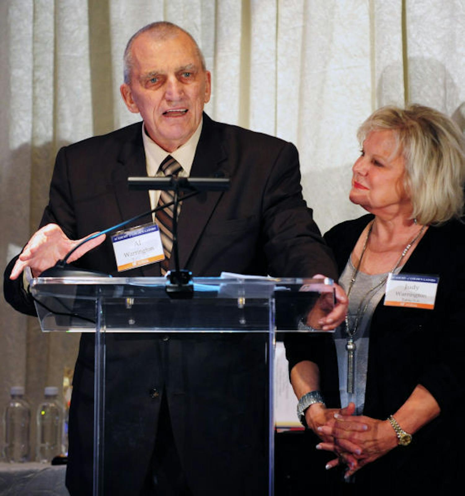 Al and Judy Warrington speak at a gala event held in their honor in Emerson Alumni Hall on Friday night. The Warringtons became the first $100 million donors after announcing a $75 million pledge at the event.