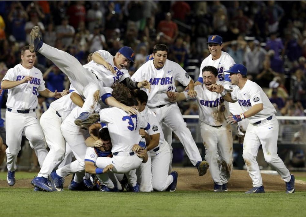 <p>Florida's baseball team celebrates following its 6-1 victory over LSU on Tuesday in Game 2 of the College World Series Finals at TD Ameritrade Park in Omaha, Nebraska.</p>