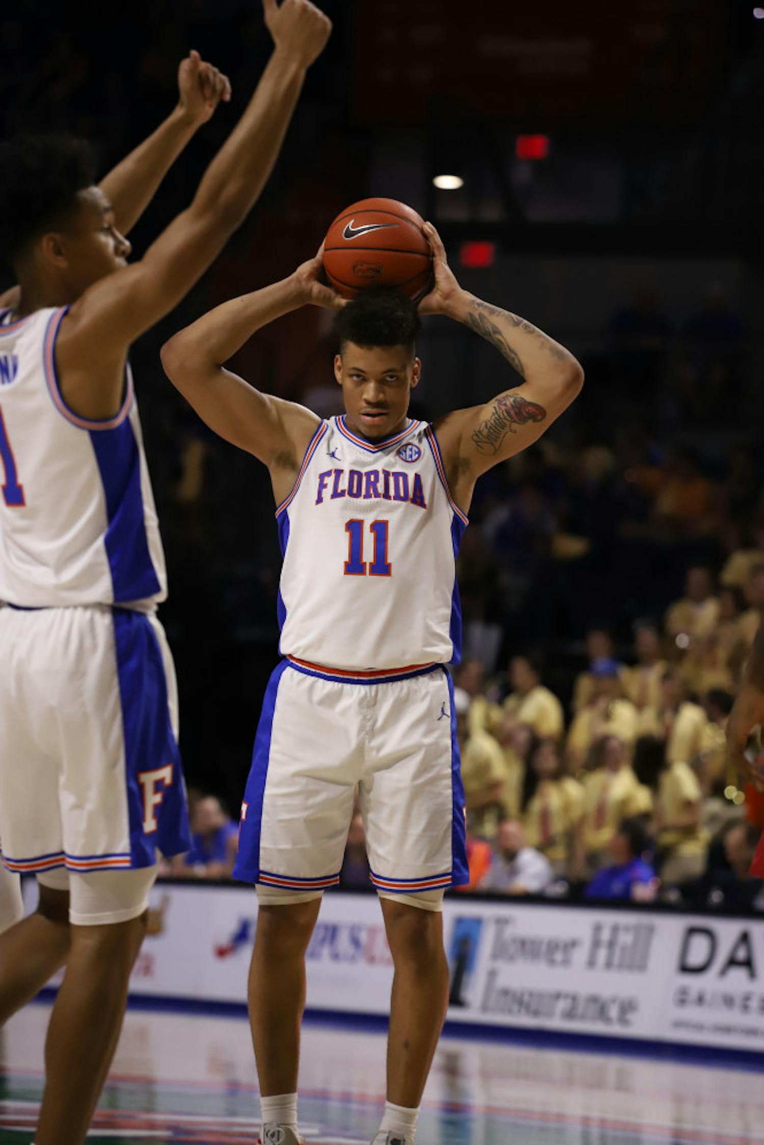 Junior Keyontae Johnson at the Gators' home game against Arkansas last season. Florida will allow up to 2,200 fans into the O'Connell Center for basketball games this season.
