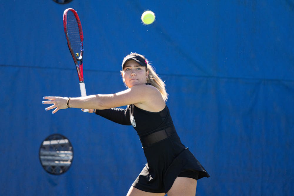 Gators women's tennis sophomore Rachel Gailis goes for a forehand shot in the women's tennis team's match against Baylor on Saturday, January 20, 2024. 
