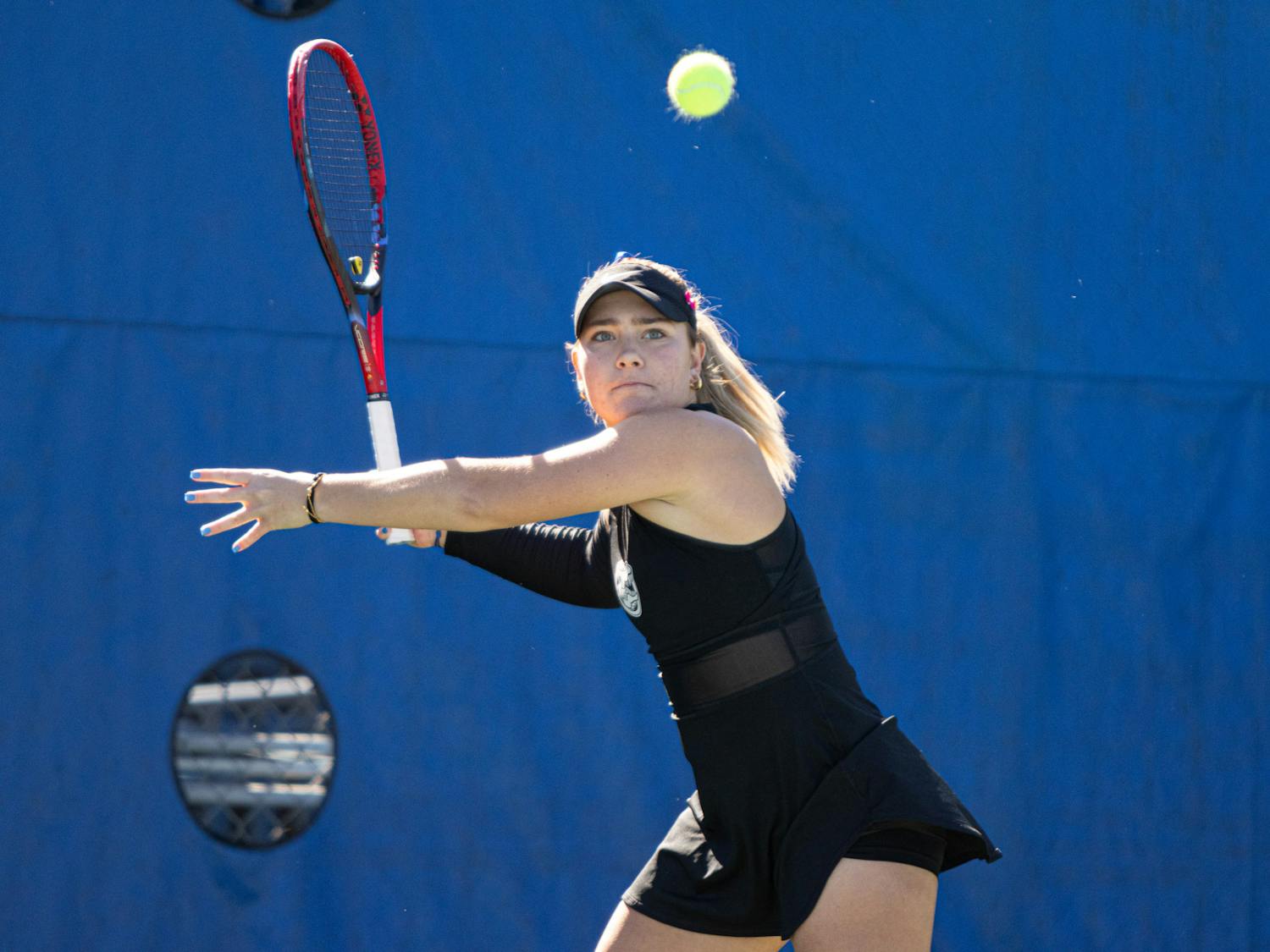 Gators women's tennis sophomore Rachel Gailis goes for a forehand shot in the women's tennis team's match against Baylor on Saturday, January 20, 2024. 