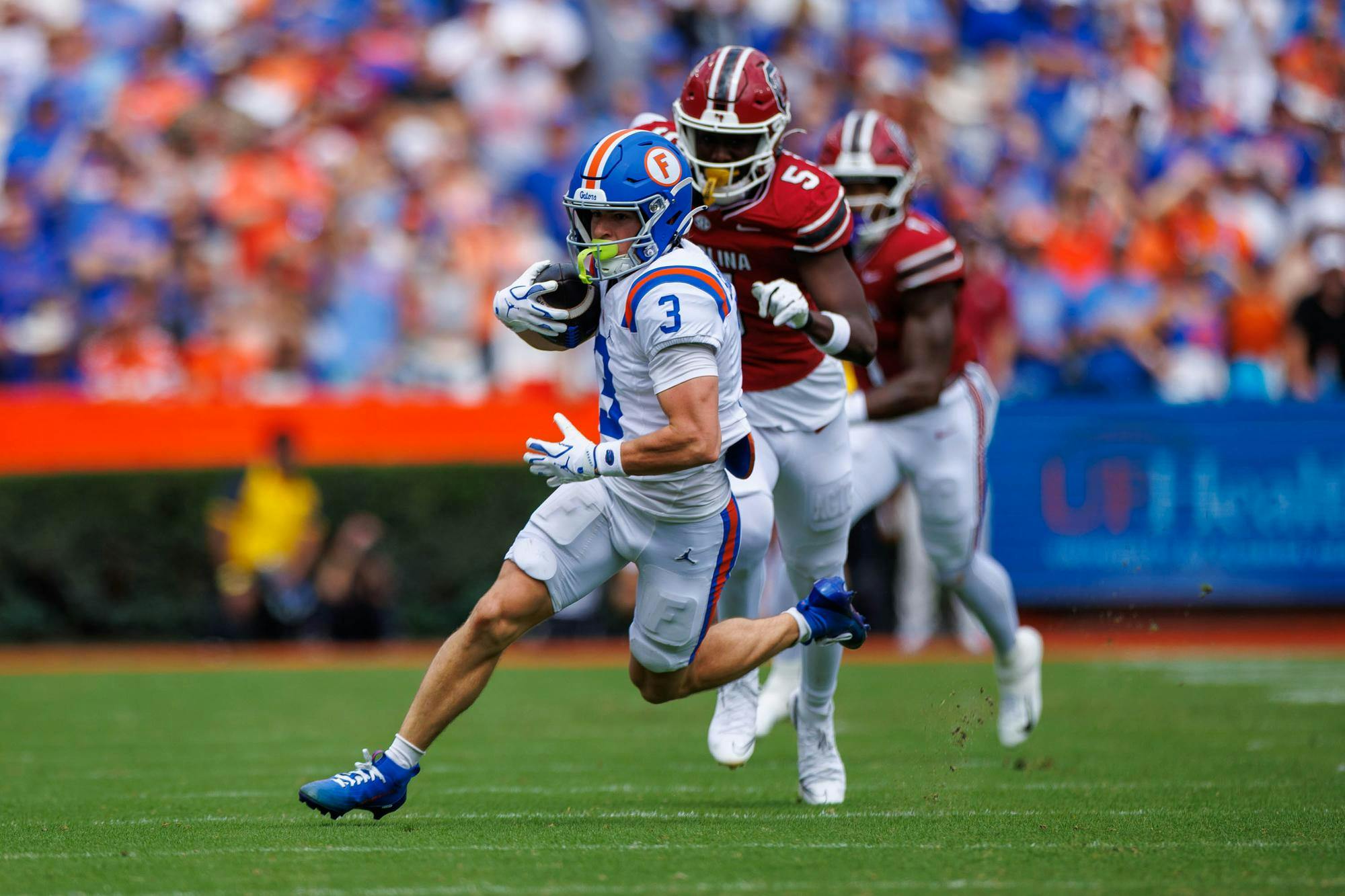 Florida wide receiver Bailey Stockton (3) runs to the end zone during the first half of an NCAA college football game against South Carolina, Saturday, Oct. 10, 2026, in Gainesville, Fla.