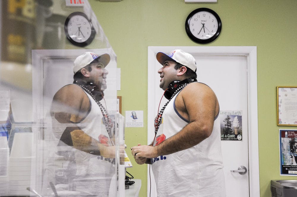 Torres orders ice cream at D'Lites Emporium, 4216 NW 16th Blvd., after performing as Dj Raffy.