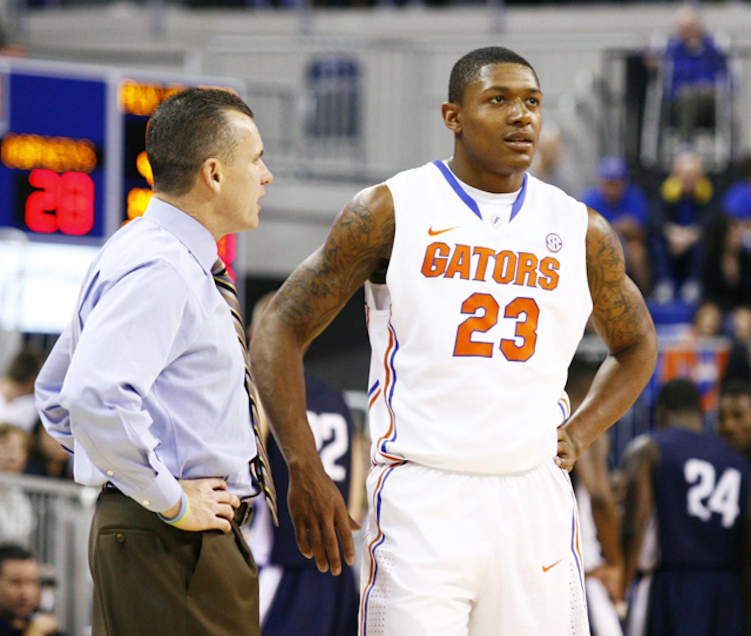 UF coach Billy Donovan (left) said working with freshmen like Brad Beal (right) has been a rewarding part of the job and something that keeps him motivated after 18 years.